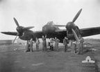 A Beaufighter Mark II aircraft of No 456 Squadron RAAF at Valley airfield. Left to right; Leading Aircraftman (LAC) Abbot, Sergeant Pilot Stevens, LAC Molloy, LAC Gibson, Corporal (CPL) Cooper, CPL Thomas.