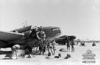 Gambut, Cyrenaica, Libya. c. 1943. Ground crew personnel of No. 459 Squadron RAAF work on a Lockheed Hudson aircraft.