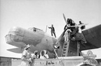 Tunisia. 1943. Maintenance section of No. 1 Air Ambulance Unit RAAF at work on the propeller of one of the Units Bristol Bombay aircraft.