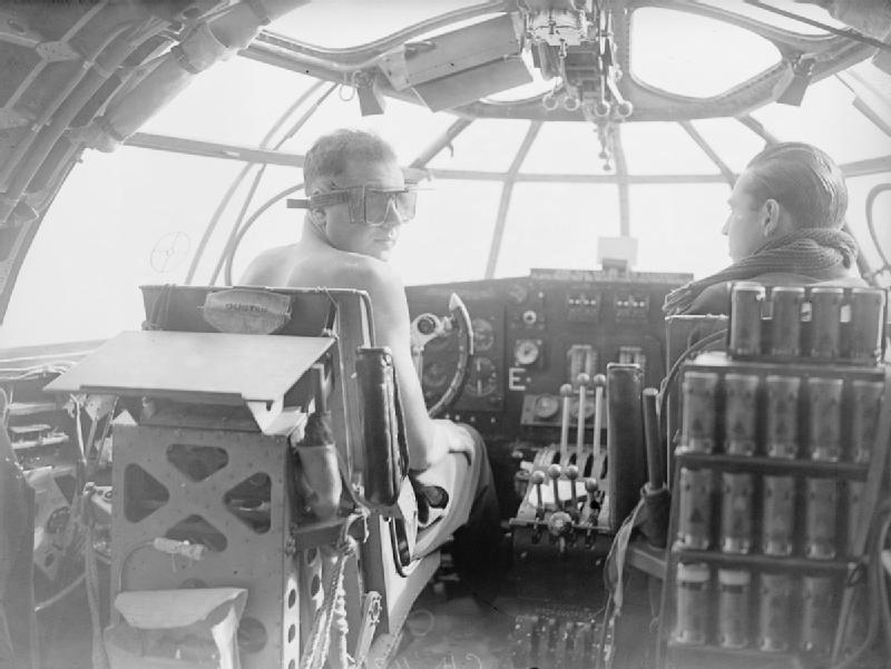 The pilots of a
                    Sunderland of No 10 Squadron RAAF over the Atlantic,
                    June 1940