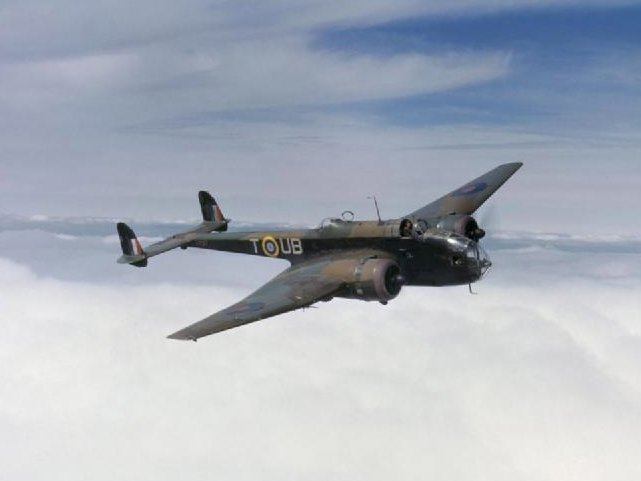 Handley Page Hampden Mark I, AT137 'UB-T', of No 455 Squadron RAAF based at Leuchars, Fife, Scotland, in flight above clouds, May 1942.