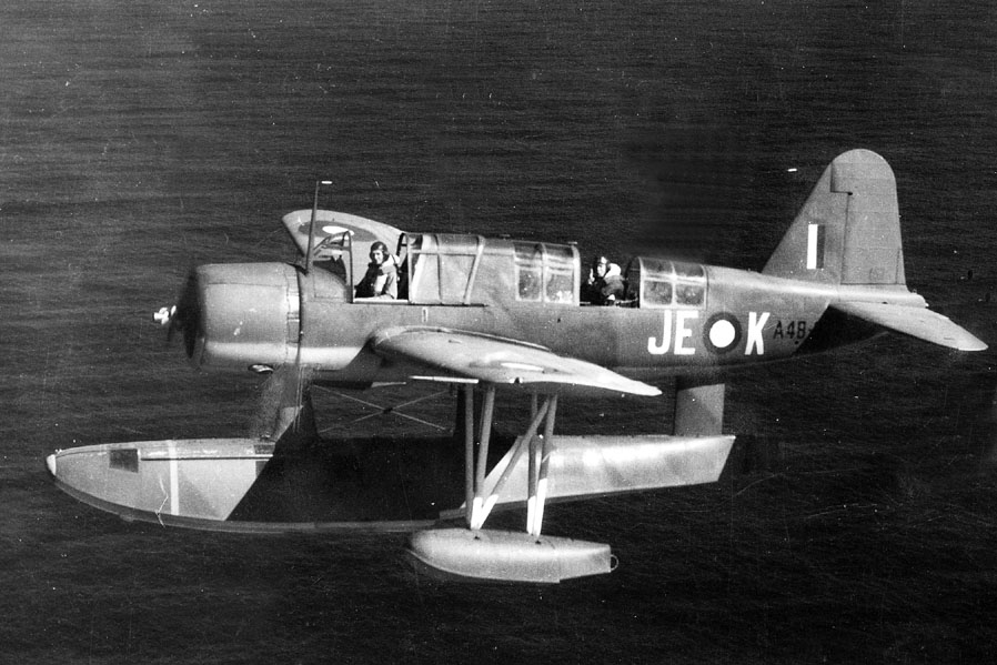 OS2U-3 Kingfisher 
A48-9/JE-K 
in flight over the Tasman Sea, 
107 Squadron, c.1944. 
via Mike Mirkovic.