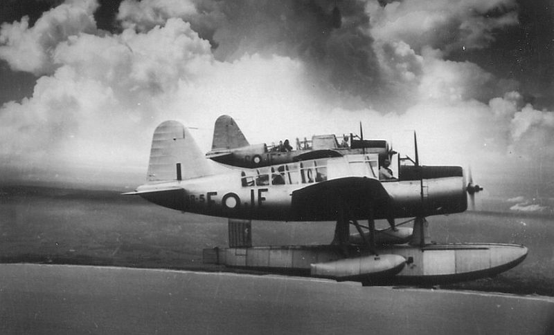 OS2U-3 Kingfishers 
A48-5/JE-F and A48-17/JE-S 
over Jervis Bay, 
107 Squadron, c.1945. 
via Mike Mirkovic.