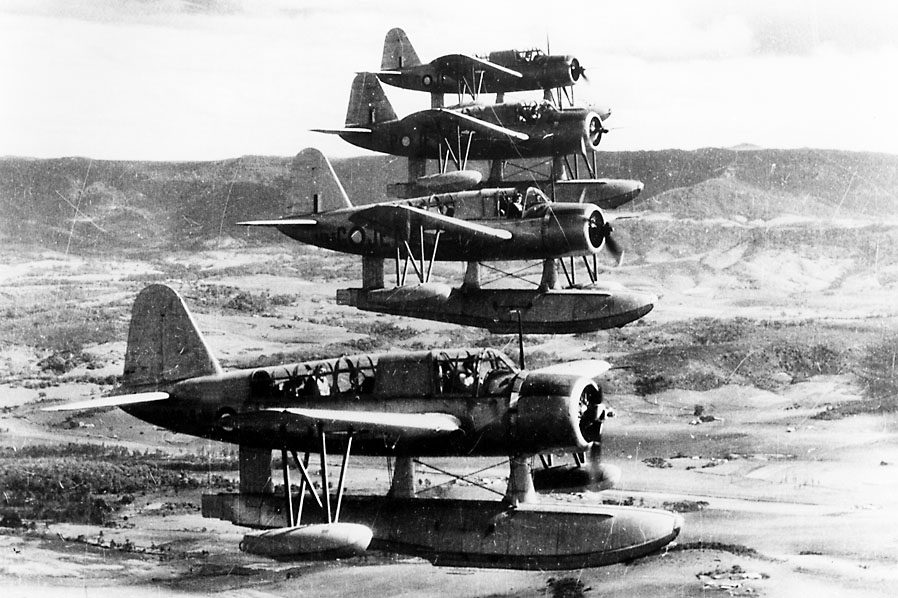 Four OS2U-3 Kingfishers in flight, 
A48-4/JE-E, A48-6/JE-G, A48-14/JE-P and A48-3/JE-D, 
107 Squadron, c.1944/5. 
via Mike Mirkovic.