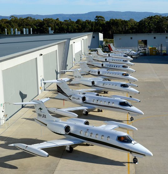 The current Air Affairs
                Australia Learjet fleet (front to rear) VH-LRX, VH-LJA,
                VH-JCR, VH-LPJ, VH-LJJ, VH-JCX, VH-OVB