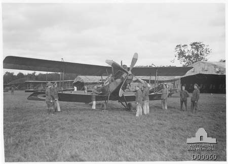 RE8 serial B7834(?) 
with SE5A aeroplane in background.
 AWM D00060.