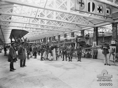 SE5A A4849 and RE8 A4166 being assembled. AWM D00050