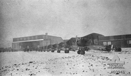 Sopwith Snipes of No 4 Squadron, Australian Flying Corps (AFC) lined up in the snow at Bickendorf, Cologne. The aircraft in the foreground is E8082. AWM A03941 via Brendan Cowan