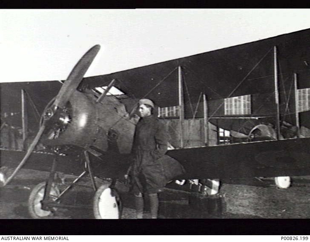 Lieutenant S (Dutchie) Howard  4 Sqn, AFC with one of the unit's Sopwith Snipes  AWM P00826_199